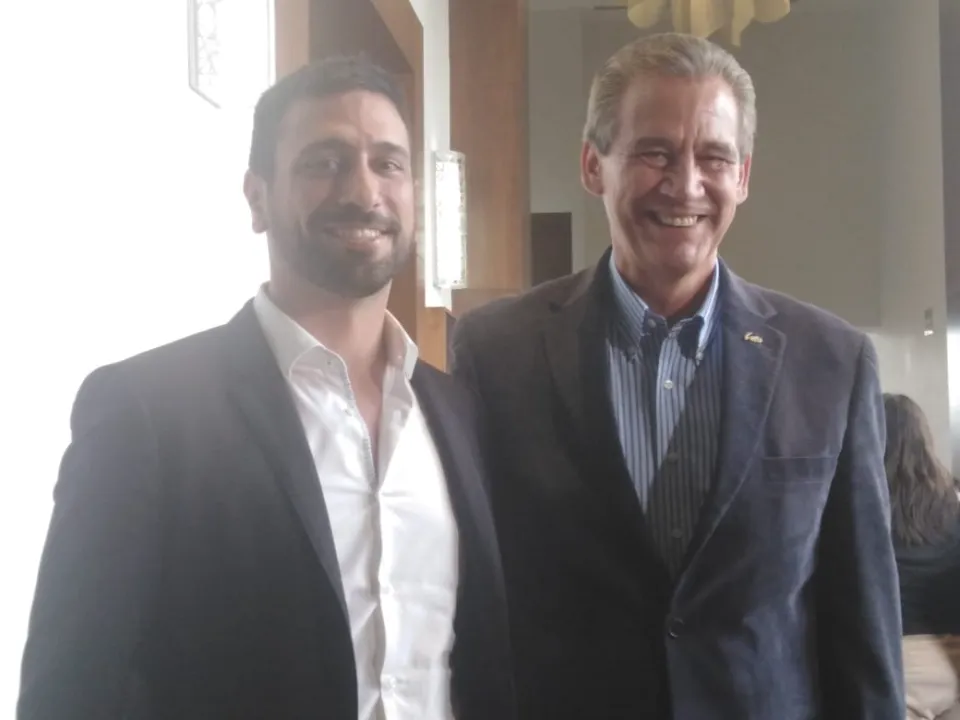 Uriel Raviv with a senior Mexican government counterpart.